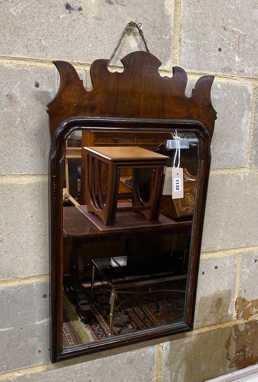 An 18th century walnut fret cut wall mirror, width 39cm, height 69cm
